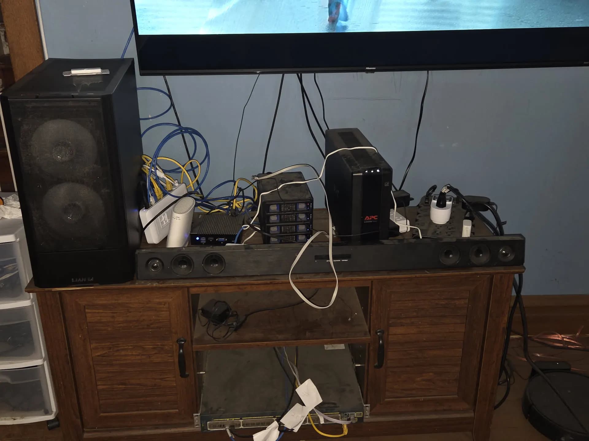 Home network, before. Gear stacked on the TV stand